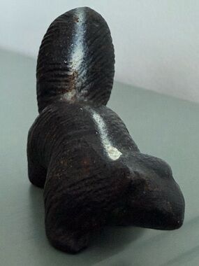 Vintage cast iron Skunk